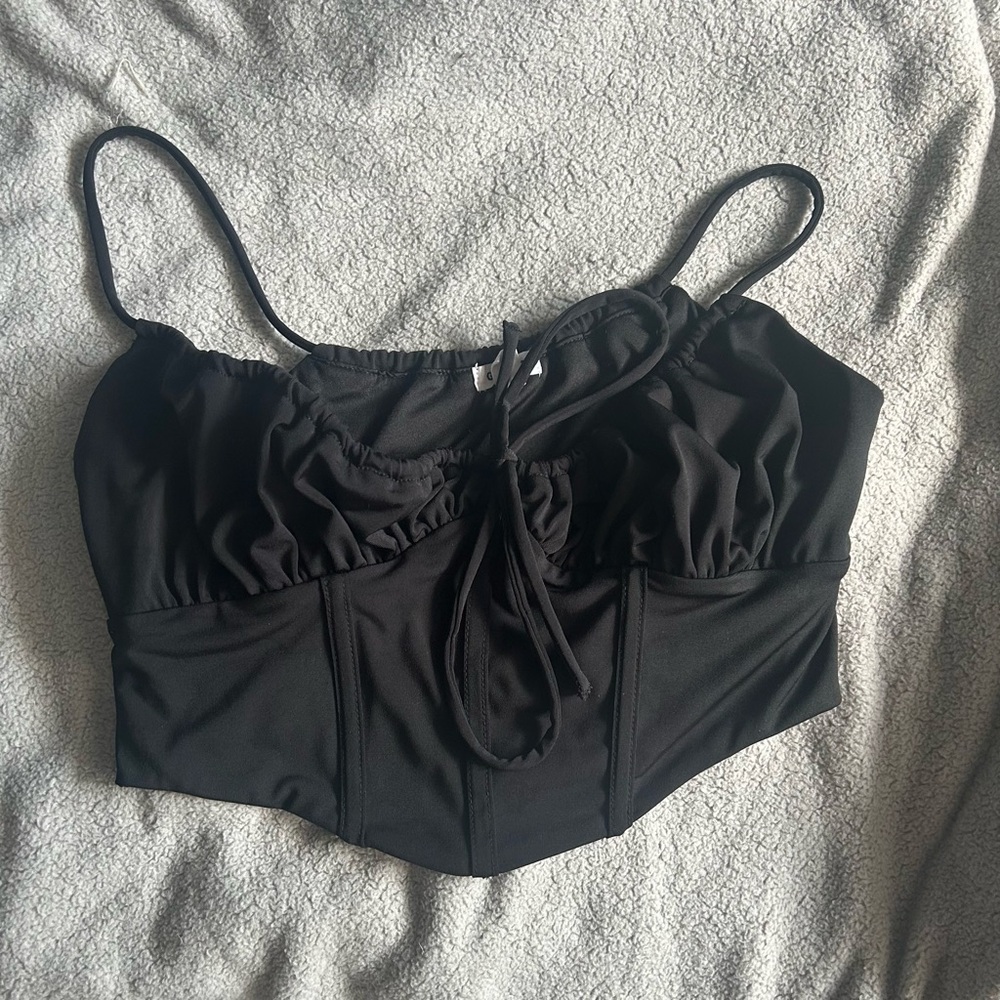 Garage corset-like going out top